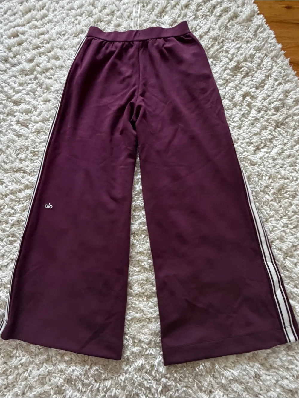 ALO Yoga Wide-Leg Track Pants in Plum with White Side Stripes - Picture 8 of 10